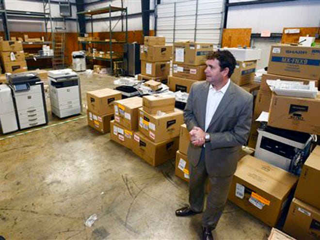Justin Gordon talks about Copy Products Company in the firm's warehouse in Montgomery. Justin Gordon got a warm welcome from his first customer. After following his career to the Atlanta area, the Montgomery native moved back earlier this year to lead an expansion by Copy Products Co.
