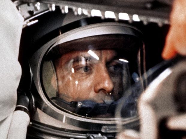Astronaut Alan Shepard prepares for one of the Mercury space missions in the early 1960s. All of that program's missions were completed during the Kennedy presidency.
