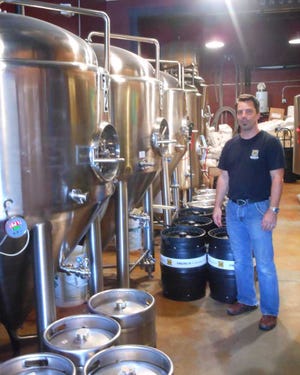 Engine 15 Brewing. Co. co-owner and brewmaster Luch Scremin at the Jacksonville Beach brewery. Engine 15 plans to build a new production brewery, tap room, canning line and outdoors beer garden in the LaVilla area of downtown.