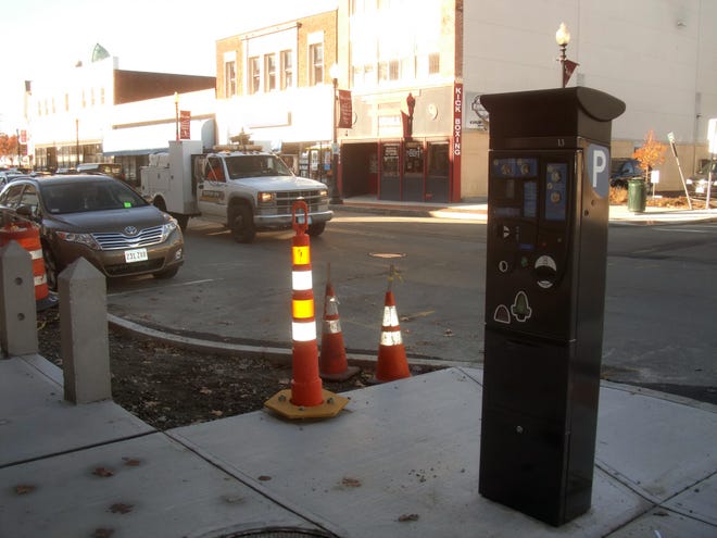 One of the new parking kiosks stands in downtown Taunton.