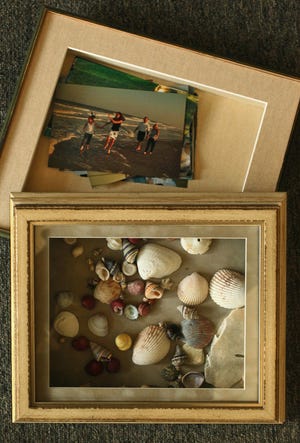 This Keepsake box using frames created at Hazel Tree Interiors in Akron, Ohio, illustrates how you can artfully display photos and mementos.