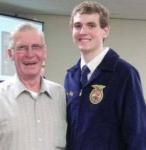 Monmouth-Roseville High School junior Evan Ray proudly takes a picture with his grandpa, Merlin. PHOTO SUBMITTED