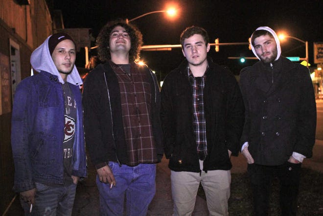 Members of the local band Hey, Presto played their third show at The Boobie Trap Bar, 1417 S.W. 6th, on Nov. 17. The band's members are, from left, Dustin Mauck, vocals and rhythm guitar; Phil Rissen, bass guitar; Robbie Richmond, drums; and Ryan Boman, lead guitar and backup vocals.