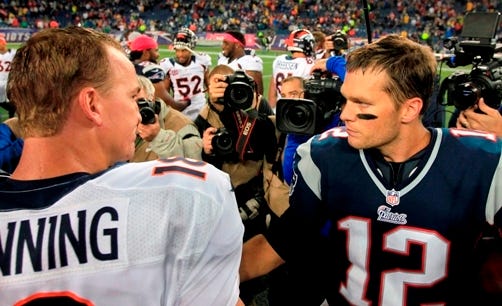 Denver Broncos quarterback Peyton Manning, left, and New England Patriots quarterback Tom Brady, right, meet in the middle of the field after the Patriots beat the Broncos 31-21 last season Foxbo. Manning and Brady will square off for the 14th time Sunday.