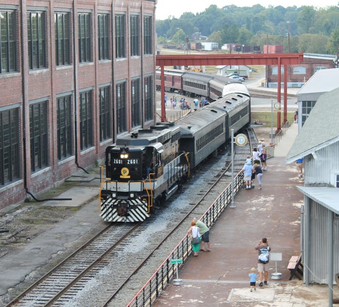 A train makes its way past the Back Shop at the N.C. Transportation Museum in Spencer.