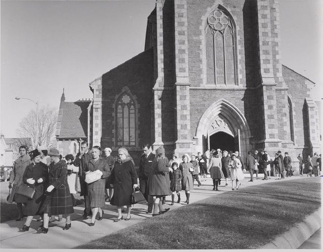 Mourners depart a memorial Mass for President Kennedy at St. Mary’s Church in Taunton days after his assassination on Nov. 22, 1963.