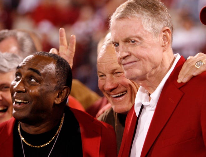 Tom Osborne, right, poses with Barry Switzer during an OU-Nebraska game in 2008. [PHOTO BY STEVE SISNEY, THE OKLAHOMAN]
