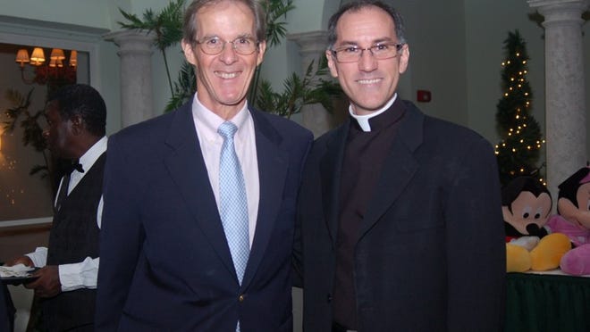 Bill Metzger and Father Gavin Badway