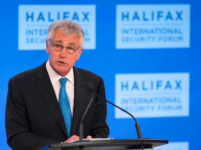 U.S. Secretary of Defence Chuck Hagel addresses a session at the Halifax International Security Forum in Halifax, Canada, on Friday, Nov. 22, 2013. (AP Photo/The Canadian Press, Andrew Vaughan)