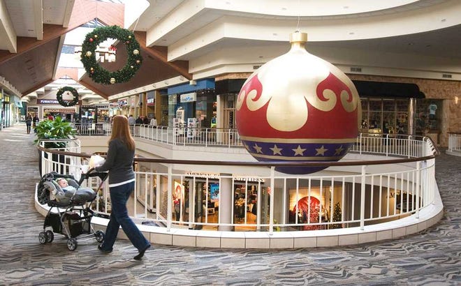 West Ridge Mall is decorated for Christmas and ready for the holiday rush of shoppers, whose numbers, as usual, have been increasing gradually since Santa Claus arrived earlier this month. Mall traffic is expected to be heavy over the Thanksgiving weekend.