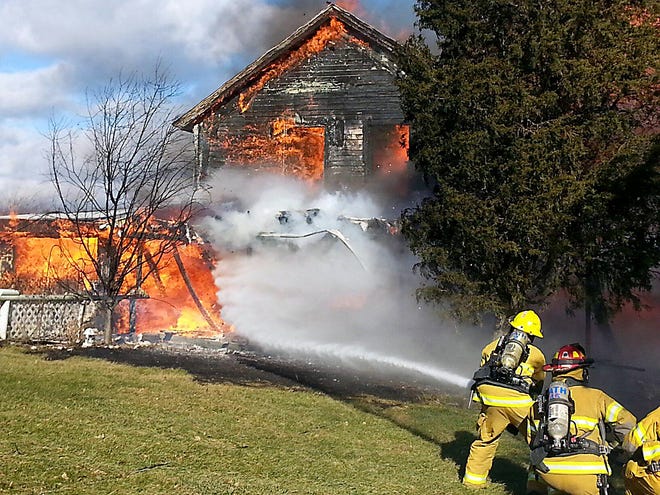 Firefighters battle a blaze at a home on Windfall Road in the Town of Bath. Photo courtesy of Bath Volunteer Fire Department