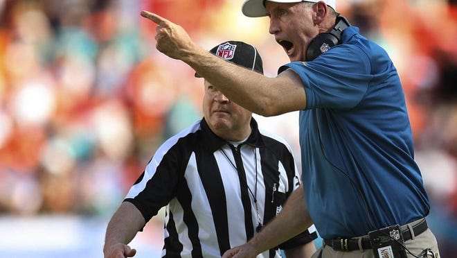 Miami Dolphins head coach Joe Philbin, reacts after the game officials called an incomplete pass on a play in the end zone during NFL regular season game between Miami Dolphins and Carolina Panthers Sunday afternoon, Nov 24, 2013 at Sun Life Stadium in Miami Gardens.(Bill Ingram/Palm Beach Post)