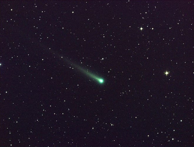 In this photo provided by NASA, Comet ISON shines in this five-minute exposure taken at NASA's Marshall Space Flight Center on Nov. 8 at 5:40 a.m. EST. At the time of this picture, Comet ISON was 97 million miles from Earth, heading toward a close encounter with the sun on Nov. 28. Located in the constellation of Virgo, it is now visible in a good pair of binoculars. (AP Photo/NASA, Aaron Kingery)