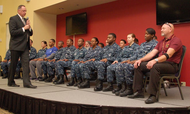 Stage hypnotist and retired USMC Master Sgt. Bryan McDaniel invited 19 Sailors and civilians to be part of the NAS Jax Holiday Safety Stand Down Nov. 20 at Dewey's All-Hands Club.