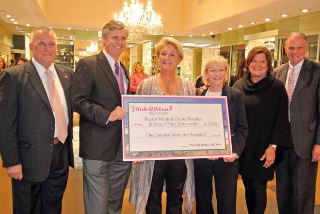 Above: Underwood Jewelers held a trunk show to benefit the Pink Ribbon Golf Classic, which raises money for cancer research. Pink Ribbon chairwoman Millie Harrison (third from left) presented a $135,000 check to be shared by Baptist Medical Center - Beaches and Mayo Clinic Jacksonville. With Harrison are store manager John Rutkowski (from left), Baptist Beaches administrator Joe Mitrick, Mayo breast cancer unit supervisor Cindy Van Horn and Underwood owners Christy and Clayton Bromberg. Left: Past presidents of the Plantation Ladies' Golf Association were at the annual tournament reception.