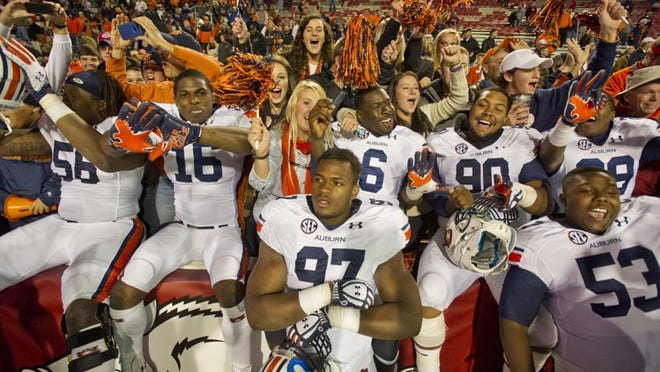 Does surging Auburn have a chance to knock off No. 1-ranked Alabama? Kirk Bohls says yes, Cedric Golden says no.