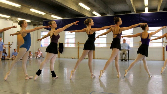 The ballerinas synchronize their moves at 'The Nutcracker' rehearsal in Gastonia on Nov 23.