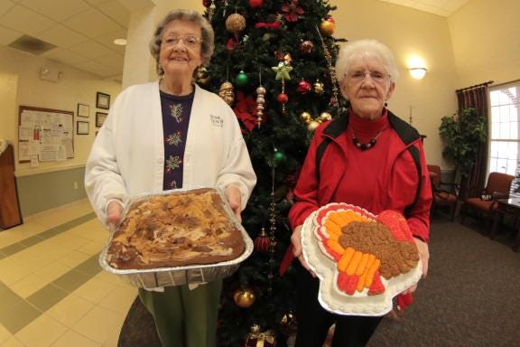 Vera Weathers, 87, left, and Addie Medford, 81, are two of the senior adults who bake cakes, pies and other sweets for the Neal Senior Center Gift Shop.