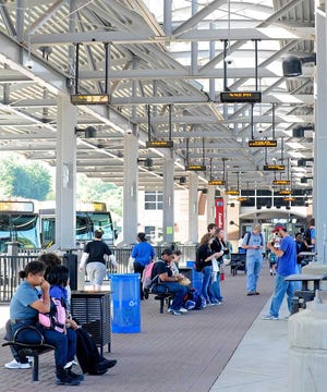 Passengers wait for their bus at the Athens-Clarke County Multi-Modal Transit Center on Monday, Sept. 24, 2012 in Athens, Ga.  Richard Hamm/Staff