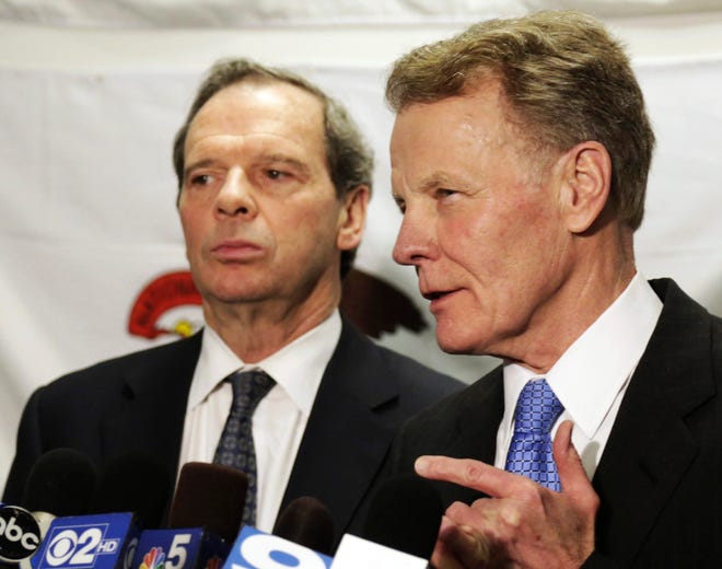 Illinois House Speaker Michael Madigan, with Senate President John Cullerton looking on at left, speaks to reporters June 10 after a meeting with Gov. Pat Quinn in Chicago to discuss the state’s pension crisis. File/The Associated Press