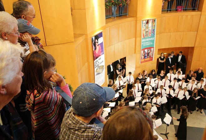 Spectators listen last year to one of a series of holiday concerts in the Lingo Rotunda of the Topeka and Shawnee County Public Library, 1515 S.W. 10th. This year's series includes more than two dozen free performances through Dec. 19.
