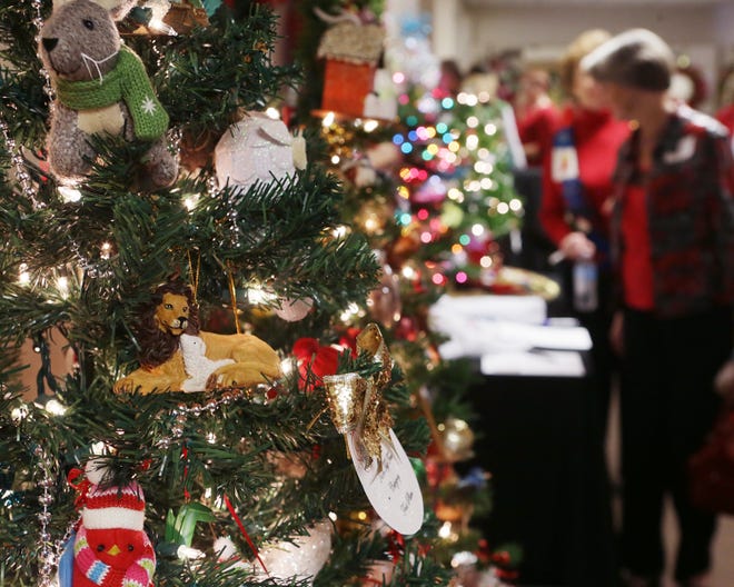 One of the many Christmas trees to be auctioned off is seen during the Festival of Trees luncheon at First Baptist Church in Panama City on Wednesday.