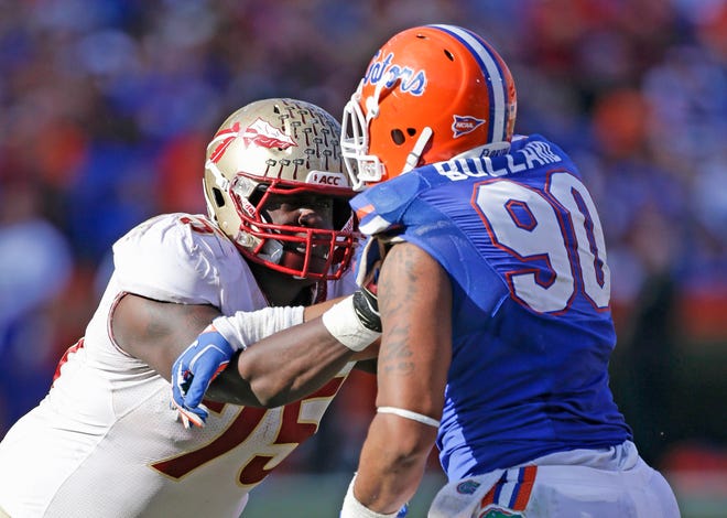 Cameron Erving was named the ACC's top lineman.