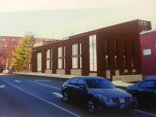 A concept design for a proposed new Dover police station and parking facility at Orchard Street, as seen from Chestnut Street.