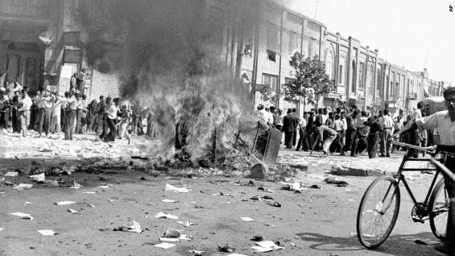 A communist newspaper's office equipment is burned in Tehran on Aug. 19, 1953, during a pro-Shah riot. A declassified CIA document acknowledges the U.S. was involved in the coup.