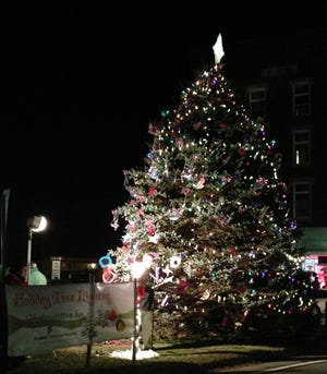 Weyers/Democrat photo

The Christmas tree is now lit at Central Square in downtown Rochester.