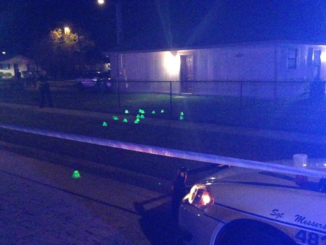 Bullet casings litter the ground after a shooting in Jacksonville Saturday night.