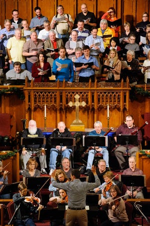 The Columbia Chorale and the Columbia Civic Orchestra rehearse together Tuesday at Missouri United Methodist Church.