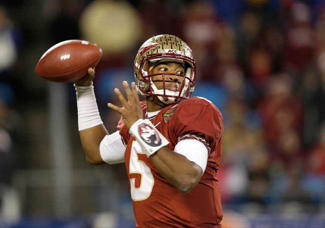 Florida State quarterback Jameis Winston (5) looks to pass against Duke in the first half of the Atlantic Coast Conference Championship NCAA football game in Charlotte, N.C., Saturday, Dec. 7, 2013. (AP Photo/Bob Leverone)