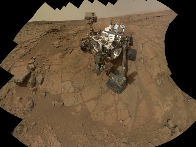 This Feb 3, 2013 image provided by NASA shows a self portrait of the Mars rover, Curiosity. NASA's Curiosity rover has uncovered signs of an ancient freshwater lake on Mars that may have teemed with microbes for tens of millions of years, far longer than scientists had imagined, new research suggests.(AP Photo/NASA)