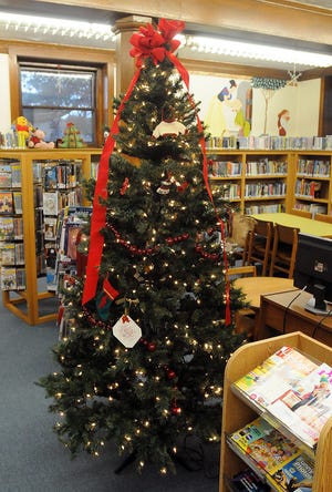The mitten tree is now up at the Bancraft Library in Hopedale.