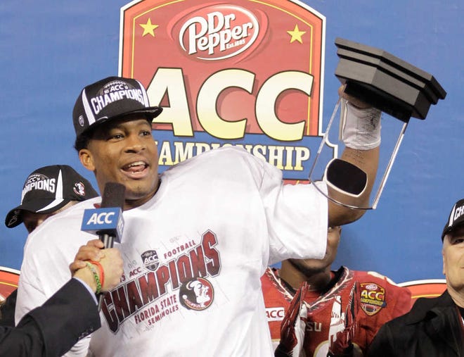 Florida State's Jameis Winston celebrates after the Atlantic Coast Conference Championship NCAA football game in Charlotte, N.C., Saturday, Dec. 7, 2013. Florida State defeated Duke 45-7. (AP Photo/Bob Leverone)