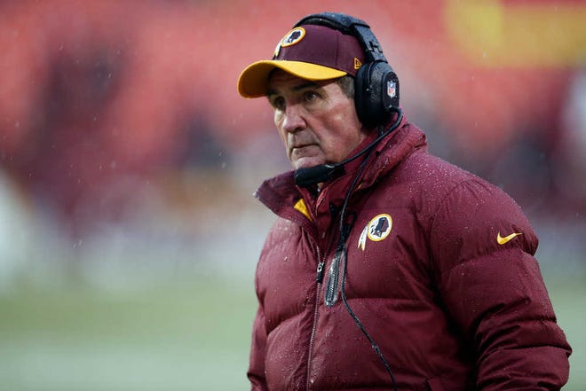 Washington Redskins head coach Mike Shanahan watches the action from the sidelines during the second half of an NFL football game against the Kansas City Chiefs in Landover, Md., Sunday, Dec. 8, 2013. The Chiefs defeated the Redskins 45-10. (AP Photo/Evan Vucci)