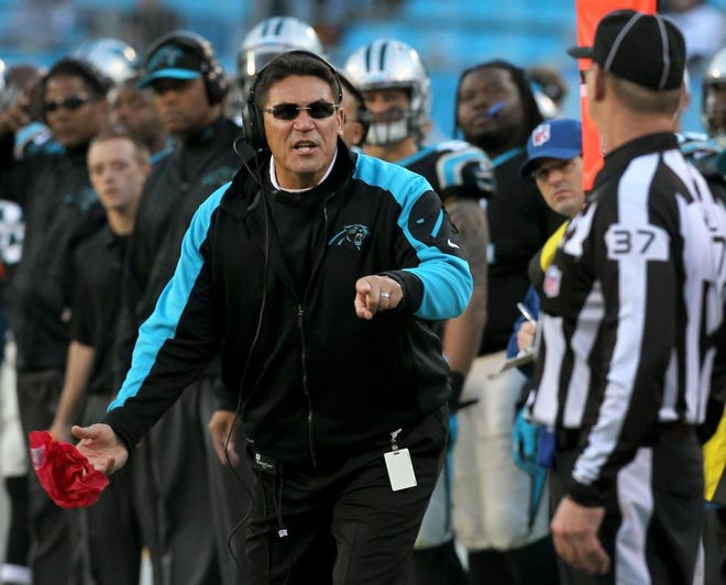 Panthers' head coack Ron Rivera throws his challenge flag during their 27-6 win over the Bucs at Bank of America Stadium on Dec. 1.