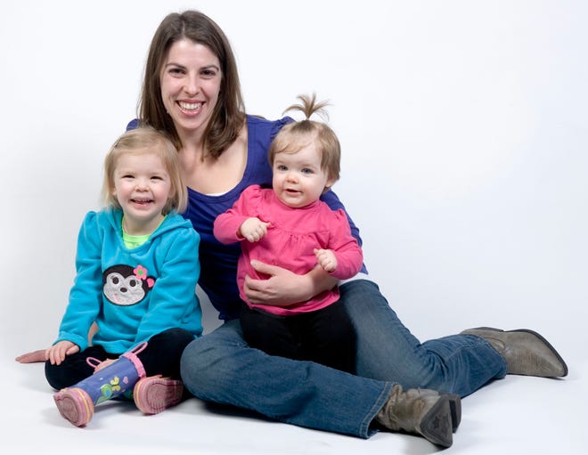 Editor Dorothy Wallheimer with daughters, Ellie, 3, and Katie, 1.