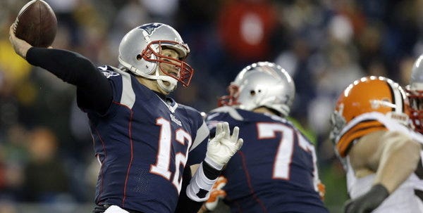 New England Patriots quarterback Tom Brady (12) passes against the Cleveland Browns in the fourth quarter of an NFL football game on Sunday, Dec. 8, 2013, in Foxborough, Mass.