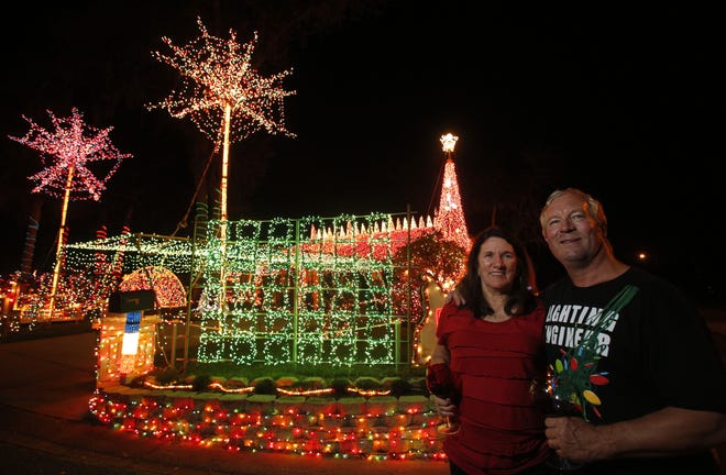 Mike and Patti Weber decorated their house with hundreds of thousands of lights recently in Port Orange.