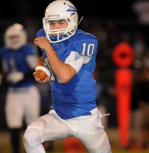 Clay quarterback Wes Weeks runs for a touchdown against Lakewood. Clay seeks Clay County's first state title since 1967 on Friday in Orlando when the Blue Devils face Plantation American Heritage.