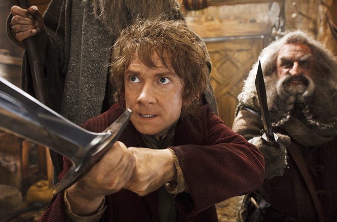 Martin Freeman, left, and John Callen star in "The Hobbit: The Desolation of Smaug." The Associated Press