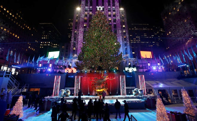 FILE - This Dec. 4, 2013 file photo shows the Rockefeller Center Christmas tree in New York. It's that time of year: holiday music time. And with holiday music comes all the strange and twisted things we sometimes think we're hearing. Mondegreens, the moniker for misheard words in song, aren't restricted to holiday standards, of course, but the old-timey language of some seems to serve as a botched-lyric magnet. (AP Photo/Kathy Willens, File)