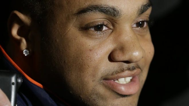 Aurburn junior running back Tre Mason, a former Park Vista High School standout, talks to reporters Friday in New York. Mason says the example his father, Vincent — a Brooklyn native who’s a member of the Grammy-winning hip-hop group De La Soul — set was inspirational. “Music was never my thing. … It motivated me, though, who my dad is,” Tre said. “He’s made it. I’ve seen him make it from nothing. He doesn’t really give us anything. He makes us work for everything, so my work ethic is very strong.” (AP Photo/Julio Cortez)