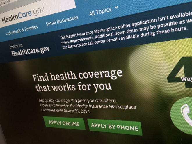 FILE - This photo of part of the HealthCare.gov website is photographed in Washington, in this Nov. 29, 2013 file photo. Newly released federal figures, as of Nov. 30, 2013, show more people are picking private insurance plans or being routed to Medicaid programs in states with Democratic leaders who have fully embraced the federal health care law than in states where Republican elected officials have derisively rejected what they call "Obamacare." (AP Photo/Jon Elswick, File)