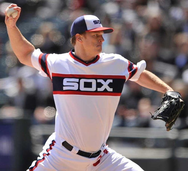 FILE - In this April 21, 2013 file photo, Chicago White Sox starter Gavin Floyd delivers a pitch against the Minnesota Twins during the first inning of a baseball game in Chicago. The Atlanta Braves have reached an agreement to sign free-agent right-handed pitcher Gavin Floyd to a one-year deal. The addition of Floyd, confirmed by the team on Monday, Dec. 16, 2013, gives the Braves a veteran starter to replace Tim Hudson, who signed with the Giants. (AP Photo/Paul Beaty, File)