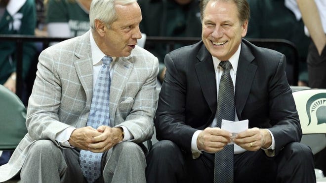Look who Texas’ next two opponents are — Roy Williams’ (left) North Carolina Tar Heels on Wednesday, then Tom Izzo’s (right) Michigan State Spartans on Saturday.