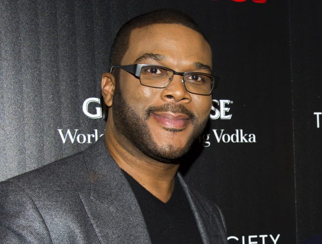 This Oct. 18, 2012 file photo shows Tyler Perry at a screening of "Alex Cross" in New York. From writing, directing and producing his own films and TV shows, Tyler Perry doesn't have a lot of time for outside projects. One he's glad he made work is a role in director David Fincher's "Gone Girl" movie adaptation. Based on the bestselling novel by Gillian Flynn, "Gone Girl" is about a man who comes under suspicion after his wife goes missing. It stars Ben Affleck and Rosamund Pike. Perry plays Affleck's character's attorney.