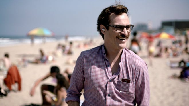 Joaquin Phoenix stars in Spike Jonze’s ‘Her,’ which earned four awards, including best picture of the year, from the Austin Film Critics Association.